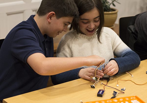kids working on STEM projects together